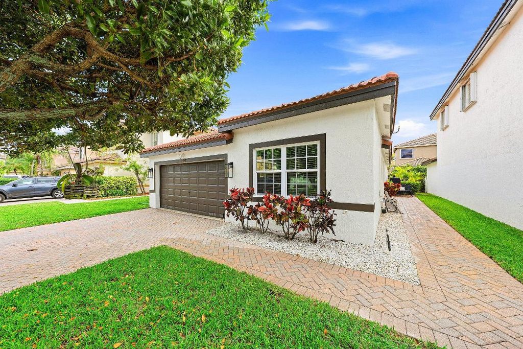 Photo of 4052 Crescent Creek Place, Coconut Creek, FL 33073 (MLS # R11155055)