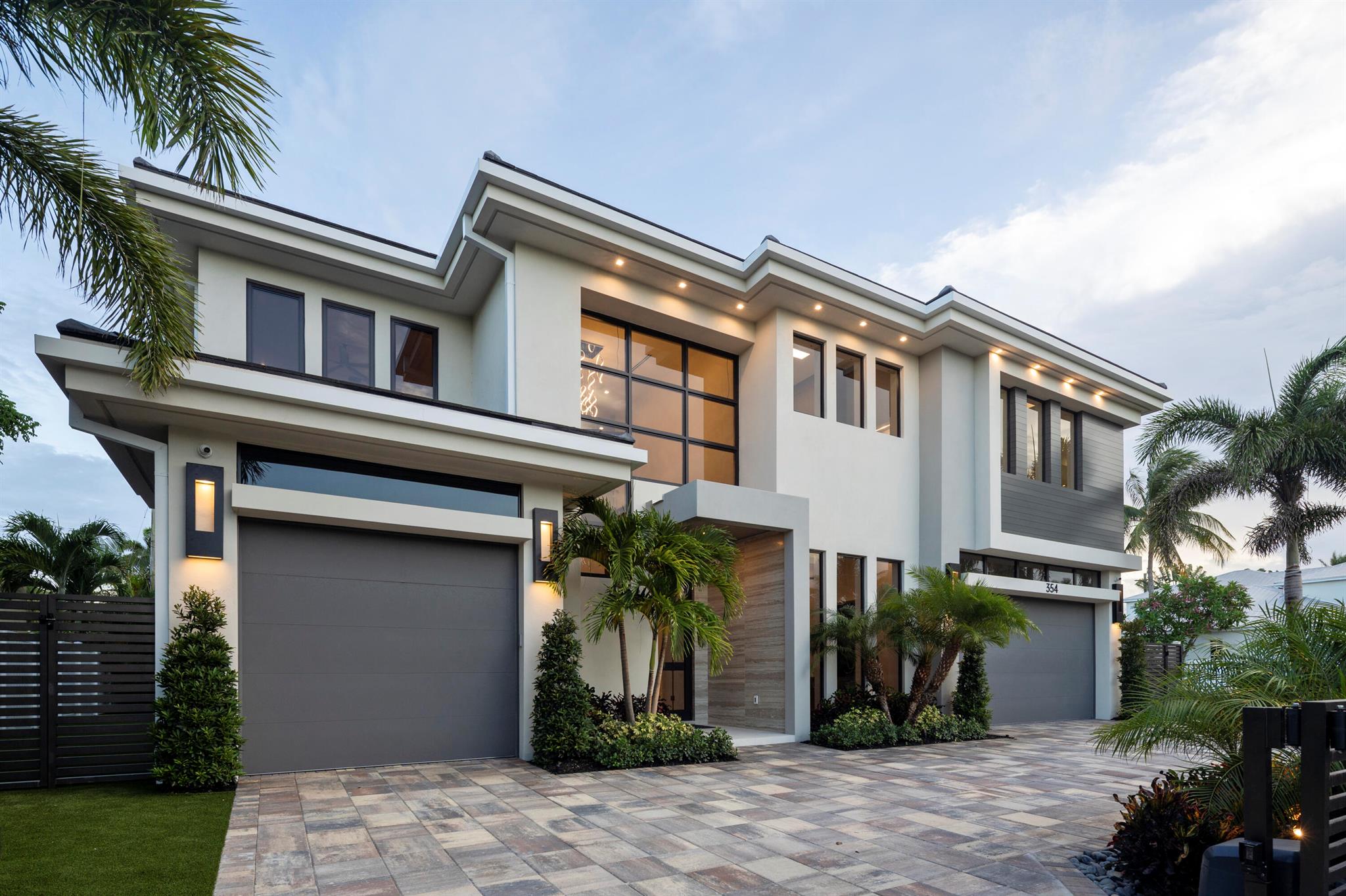 This isn't just another home in Boca Villas--this is the one. Forget the comparisons. This home doesn't play by the rules--it sets them. It's your personal sanctuary, your private escape, and your ultimate stage for unforgettable entertaining. From the moment you walk in, you're hit with that rare feeling: calm confidence, a spontaneous smile, and a jolt of ''I've finally found it.''Born from bold vision and crafted to impress, this modern masterpiece blends laid-back luxury with grand, open-concept living. Sun-soaked spaces invite the outdoors in, yet still feel cozy enough for a quiet movie night in fuzzy socks and candlelight. Designed for everyone, yet perfect for just you, the home offers five ensuite bedrooms--including a guest suite on the first floor--along with a stylish home