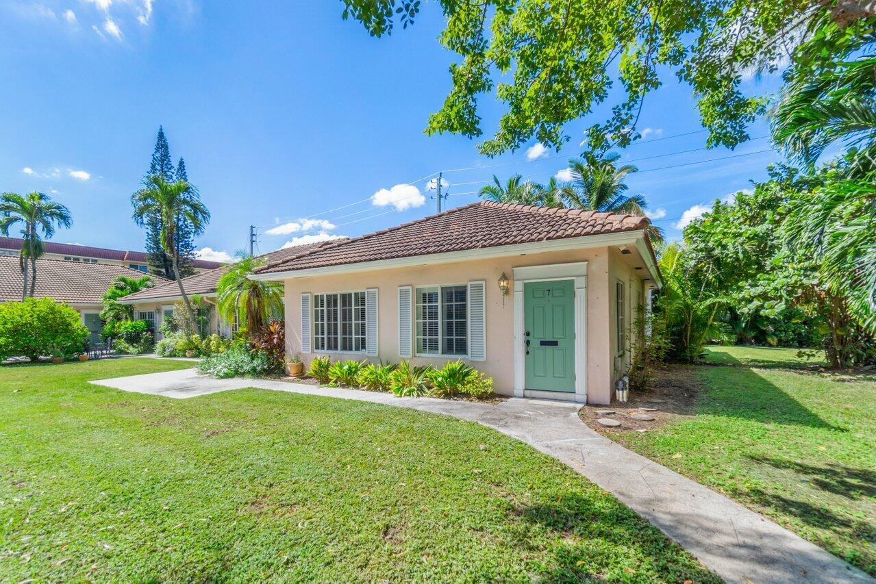 Lovely villa only 2 blocks from the beach! Lives like a single family home. Many recent updates including impact windows. Perfectly nestled between the intracoastal waterway and the ocean. A short stroll to the Waterstone Resort (Restaurants and an amazing view of Lake Boca Raton), the Boca Inlet Park and the ocean! Freshly painted corner unit with 2 bedrooms, 2 baths and a Florida room. Located in Boca's storied ''Estates Section'' among multimillion dollar mansions lining the Intracoastal Waterway. Spacious master bedroom with French doors that open into the sunny Florida room. Florida room leads to secluded private patio where you can enjoy the ocean breeze and hear the ocean waves. Full sized washer & dryer inside the home. Vacant, easy to show