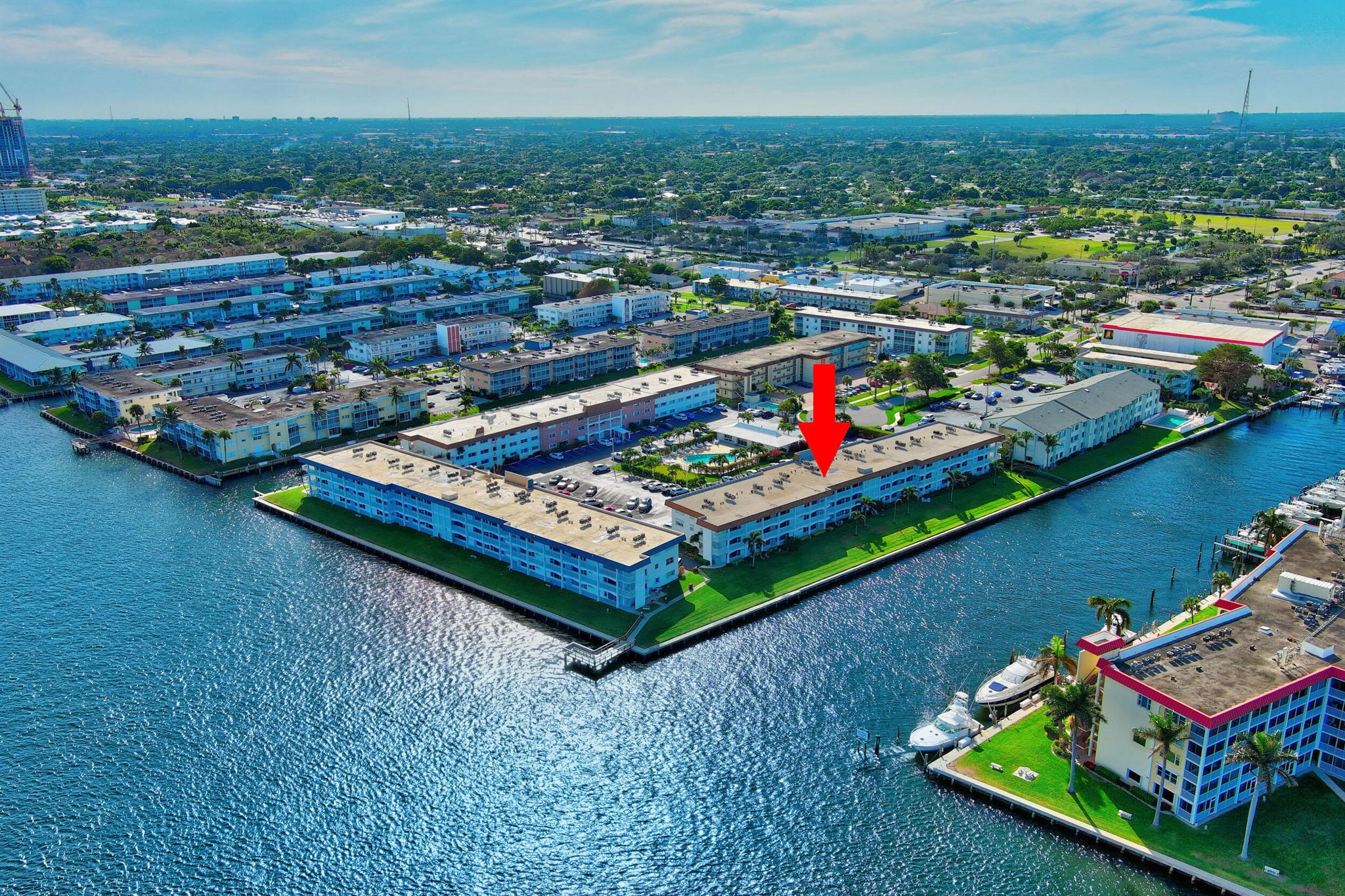Charming home with stunning view of the Intracoastal Waterway in the heart of North Palm Beach. This home has an open living space with beautiful views. Shutters complete. Situated close to shops, dining and entertainment. This 55+ Community has a Social Clubhouse, Heated Pool, BBQ Grills and Fishing Dock. 20 minutes from PBI, 5 minutes from the beach. ROOF 2022, NEW ELEVATORS, NEW RAILINGS! One photo of the living / dining has been virtually staged.