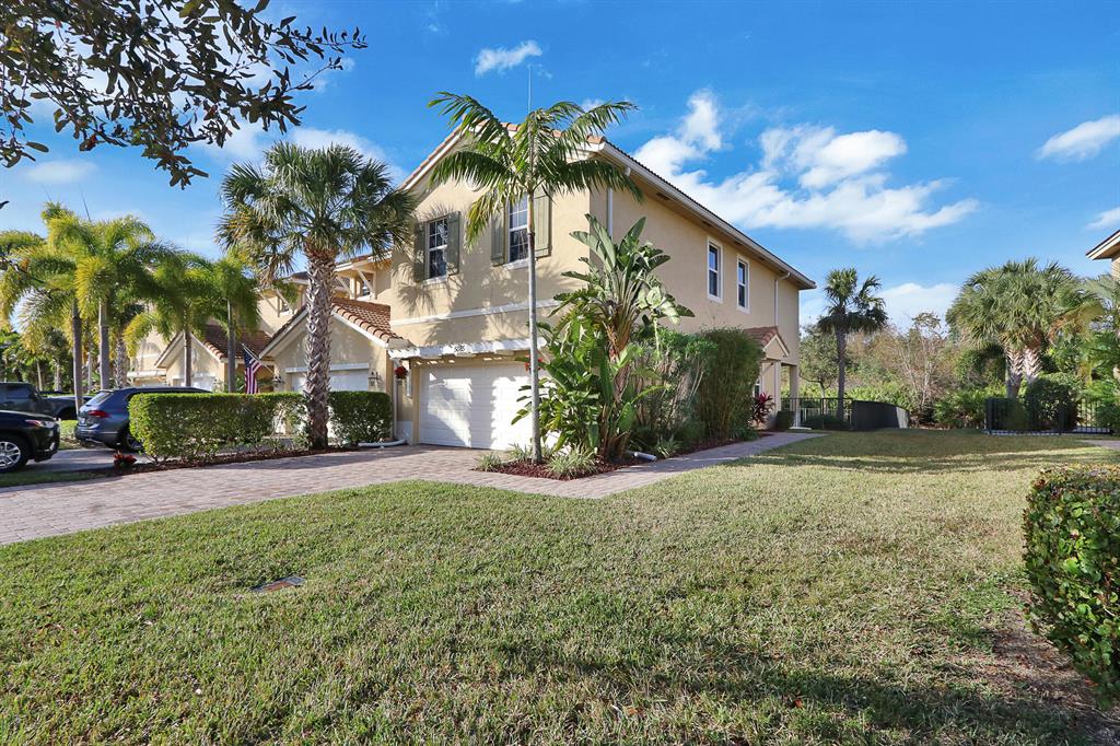 Beautiful 3 BR end unit townhome located on extra large lot w/ landscaped/fenced back & side yard which backs up to the preserve w/ partially covered, spacious brick paved lanai in the highly sought after gated community of Paloma. This meticulously maintained townhome has impact glass, crown moulding, tile flooring on main level, open floor plan allowing you to enjoy kitchen, dining & living room space. Perfect for entertaining! Kitchen features granite countertops, wood cabinetry, SS appliances (new oven), wine cooler & large pantry. Volume ceilings & impact glass throughout entire home. Security system included in rent. Upper level has lush carpeting throughout & large loft which can be used as office/den. 2nd floor laundry room. 2 car garage. See Supplement...