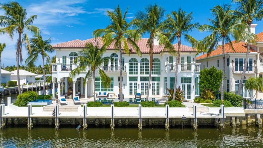 At the end of a cul-de-sac on a premier point-lot, with 243 +/- feet of waterfront and deep-water dockage on both the Intracoastal Waterway and a side canal, this wonderful estate offers the opportunity for quintessential South Florida indoor/outdoor living and entertaining. Details include light-filled interiors, stunning water views, chiseled marble flooring, beautiful ceilings, dramatic stair tower.The information herein is deemed reliable and subject to errors, omissions or changes without notice.  The information has been derived from architectural plans or county records. Buyer should verify all measurements LOCATION:

1003 Rhodes Villa, Delray Beach, Florida. In the prestigious Seagate area and Delray Beach Shores neighborhood, this ultraluxury residence, on an Intracoastal point-lot within a block of the oceanfront Atlantic Dunes Park, is just minutes from the eclectic shops, cafes and restaurants that line vibrant Atlantic Avenue. 

PROPERTY: 
 
Positioned on a premier point lot with 243 +/- feet of waterfront directly on the Intracoastal Waterway and side canal, this estate is a boating enthusiast's dream offering two new deep-water docks, which can accommodate two 100-foot yachts. A wonderful sense of place is established via a brick-paved drive and motor court set within a turf-carpeted lawn and lush tropical landscaping. With stunning sunset views of the Intracoastal Waterway as its backdrop, the covered loggia, with a pecky-cypress ceiling, summer kitchen, and grill, is just adjacent to the sparkling, salt-water, heated pool and spa. 

RESIDENCE: 

A recently updated European-inspired six-bedroom gem with 11,370 +/- total square feet, this impressive estate offers a premier location on a waterfront point-lot on a cul-de-sac street in an Intracoastal-to-ocean neighborhood. Maintaining the highest levels of privacy and prestige, its well-conceived floor plan accommodates unparalleled sunset views of the Intracoastal Waterway from all of its major rooms. The double-door entry accesses the stately foyer, with a soaring two-story ceiling and chiseled marble floors, that leads through arches past the main gallery and circular stair tower to a gracious light-filled salon, crowned by a two-story ceiling and featuring a gas fireplace with a decorative mantel, a wet bar, chiseled marble floor, and three sets of French doors that open the pool deck and Intracoastal Waterway. Also offering sunset Intracoastal views are a chic wood-paneled office as well as an inviting family room, with banks of Intracoastal-view windows and a French door that opens to the pool loggia. Just adjacent to the family room is a charming breakfast area and the center-island gourmet kitchen, fitted with custom cabinetry, granite counters, and professional-grade appliances. The formal dining room features French doors that open to the front garden courtyard, and completing the first-floor layout are a home theater,  two guest bedrooms, wine room, two half-baths, laundry room and four-car garage. Upstairs, the primary suite, detailed by marble flooring and a trey ceiling, is the ultimate in luxurious serenity. The bedroom opens to a private sitting room that leads to a spectacular balcony overlooking the Intracoastal and canal. The suite includes an office, closets, a second balcony, and two spa-inspired bathrooms. Also on the second floor are a game room and three bedroom suites, two with balconies overlooking the Intracoastal and one with a sunrise Juliet balcony.  

DISCLAIMER: Information published or otherwise provided by the listing company and its representatives including but not limited to prices, measurements, square footages, lot sizes, calculations, statistics, and videos are deemed reliable but are not guaranteed and are subject to errors, omissions or changes without notice. All such information should be independently verified by any prospective purchaser or seller. Parties should perform their own due diligence to verify such information prior to a sale or listing. Listing company expressly disclaims any warranty or representation regarding such information. Prices published are either list price, sold price, and/or last asking price. The listing company participates in the Multiple Listing Service and IDX. The properties published as listed and sold are not necessarily exclusive to listing company and may be listed or have sold with other members of the Multiple Listing Service. Transactions where listing company represented both buyers and sellers are calculated as two sales. The listing company's marketplace is all of the following: Vero Beach, Town of Orchid, Indian River Shores, Town of Palm Beach, West Palm Beach, Manalapan Beach, Point Manalapan, Hypoluxo Island, Ocean Ridge, Gulf Stream, Delray Beach, Highland Beach, Boca Raton, East Deerfield Beach, Hillsboro Beach, Hillsboro Shores, East Pompano Beach, Lighthouse Point, Sea Ranch Lakes and Fort Lauderdale. Cooperating brokers are advised that in the event of a Buyer default, no financial fee will be paid to a cooperating Broker on the Deposits retained by the Seller. No financial fee will be paid to any cooperating broker until title passes or upon actual commencement of a lease. Some affiliations may not be applicable to certain geographic areas. If your property is currently listed with another broker, please disregard any solicitation for services. Copyright 2023 by the listing company. All Rights Reserved.