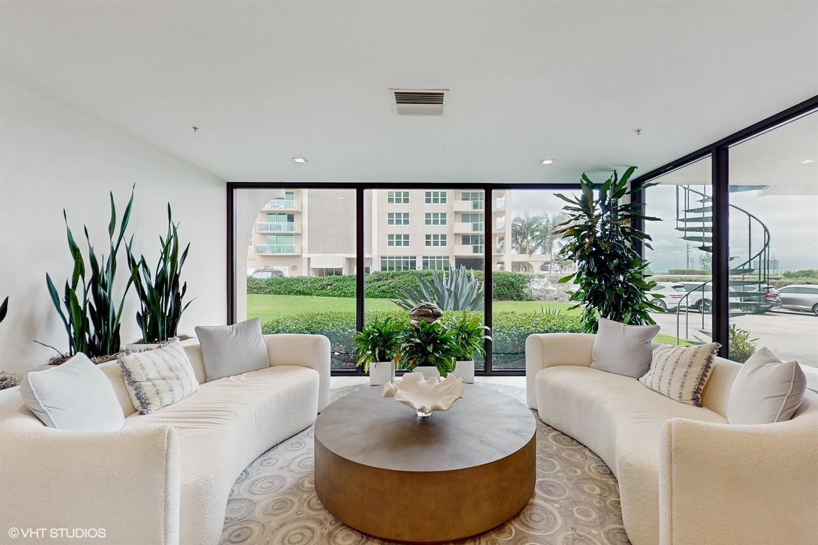 This exquisite, completely renovated (2022) first-floor condo offers breathtaking views of the ocean, Intracoastal, and pool. The home has been thoughtfully reimagined with high-end finishes, boasting new electrical, plumbing, lighting, A/C, hot water heater, fresh paint, luxurious flooring, and a fully redesigned kitchen and bathrooms. Designed with a spacious bedrooms and generous walk-in closets, private balconies with partial water views, ensuring comfort and privacy. The expansive great room is perfect for both relaxation and entertaining, leading to a wraparound balcony. Just walk to the private beach. Whether you're seeking a seasonal getaway or a year-round residence, this condo is move-in ready and offers true coastal living at its finest.
