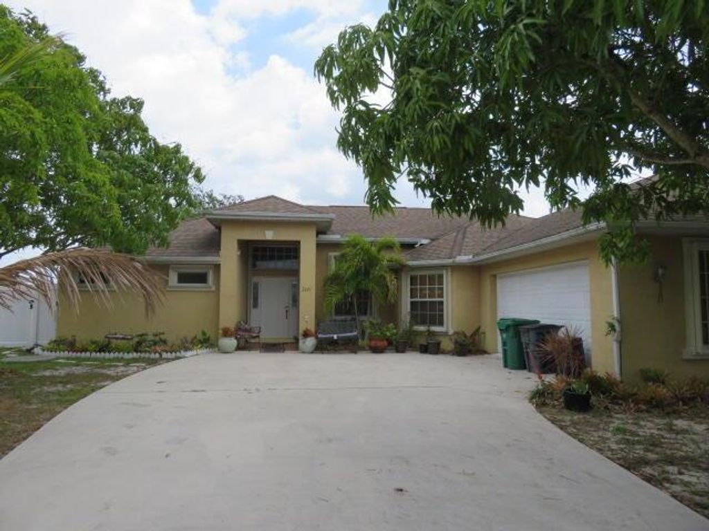 Photo of 2371 SW Susset Lane Ln, Port St Lucie, FL 34953 (MLS # R10788097)