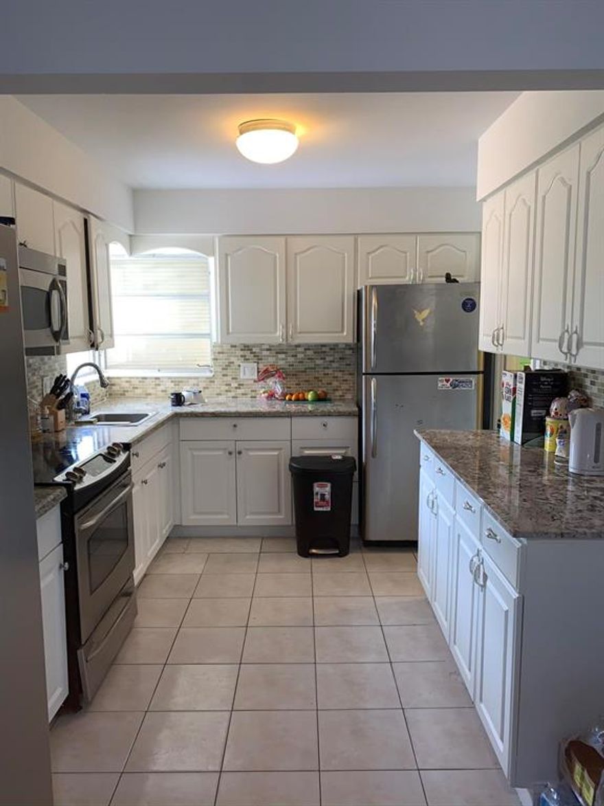 Great 3/2 home in the heart of Lake Worth Beach. Perfect for investors with great long term tenant in place until December 2021. Remodeled kitchen with granite counters and lots of storage space. 3rd bedroom has private entrance. Huge fenced in back yard with storage shed and additional exterior storage unit. Fruit trees and much more. Tons of space for RV, boats, and trailors. NO HOA! Great deal in Lake Worth Beach. Property is located in Opportunity Zone.