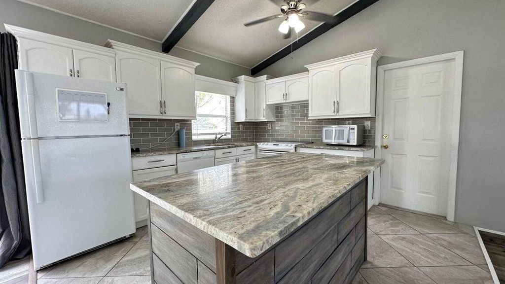 Photo of 717 SW Curry Street, Port St Lucie, FL 34983 (MLS # R11124644)