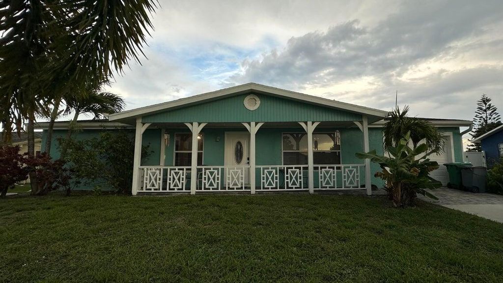 Photo of 717 SW Curry Street, Port St Lucie, FL 34983 (MLS # R11124644)