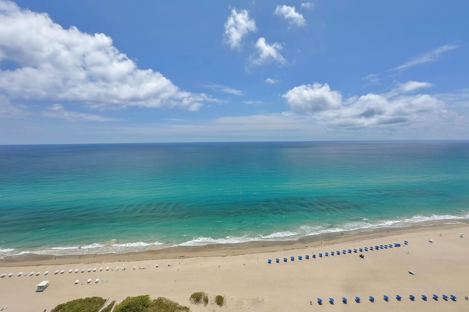 Water views as far as the eye can see! (More photos coming soon). Come home each day to this stylish 2BR/2BA split floor plan with unobstructed ocean views from every room. Floor to ceiling slider windows bring in the light and allow access to the balcony from living room and both bedrooms. Tile floors throughout. Washer/Dryer inside unit. The Tiara condo is an elegant retreat, a resort lifestyle with every amenity: valet service, 24/7 concierge & staffed gate. A 1BR suite for your guests. Heated pool, separate jacuzzi, tennis, men's & women's fitness centers w/ steam & sauna, billiard room, library, card room. Beachside restaurant - eat-in or delivery. 43rd floor Marquis lounge w/ 360 degree view. 15 mins to 1st class shopping, dining & entertainment. 25 minutes to PBI airport.