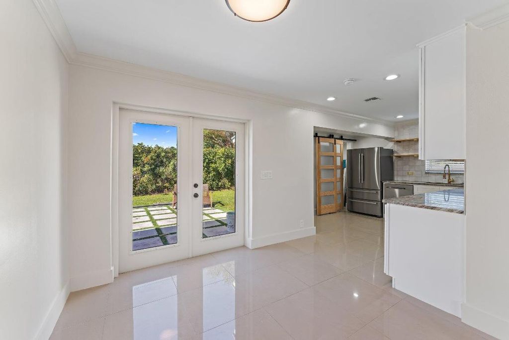 Photo of 12149 Colony Avenue, Palm Beach Gardens, FL 33410 (MLS # R10944503)