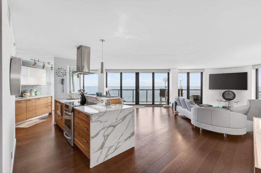 This absolutely stunning Lower Penthouse SE corner condo gives you 180 degrees views! Be mesmerized with endless direct oceanfront, Intracoastal, city, pool & marina views! Dine alfresco on the 4 balconies. Fully furnished turnkey-just bring your lucky self! If you want THE BEST--then Marbella  LPH-A is it! This exceptional property was completely renovated. Top of the line appliances, custom cabinetry, quartz countertops, complete automated window treatments, wine refrigerator, 2 drawer dishwasher, semi-private elevator, and more. There are 2 tandem garage parking spaces right by the elevator. A 50 foot private dock is available at an additional $2,500/month at the marina across the street. The ideal local landlords have a full time property manager. Truly an exceptional water view home!