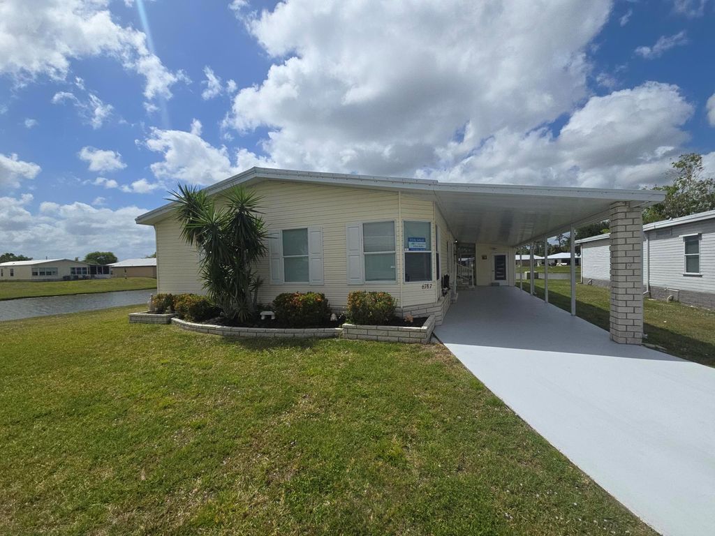 Photo of 6787 Yedra Avenue, Fort Pierce, FL 34951 (MLS # R11083081)