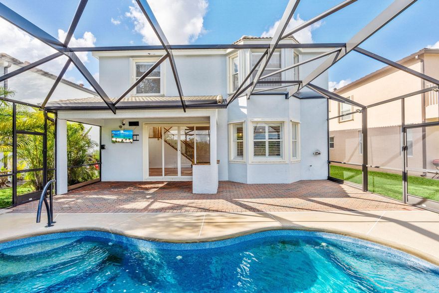 Beautifully maintained 4-bedroom home with a flex room, ideally located minutes from the clubhouse and community amenities. This home features a fiberglass heated pool, freshly painted interior, and newly painted kitchen cabinets. Smart-home upgrades include WiFi light switches throughout, Bluetooth ceiling speakers in the kitchen, LED recessed lighting, and a WiFi-enabled garage door opener. The spacious primary suite offers double walk-in closets or a versatile flex room, providing added functionality. Additional highlights include a central vacuum system and an accordion shutter upstairs. Enjoy the benefits of an HOA with no approval processestoppel only.Master Association (Tradition) $205 Monthly,Community Association (Bennington) $150 Quarterly, Master Sub-Association $491 Quarterly