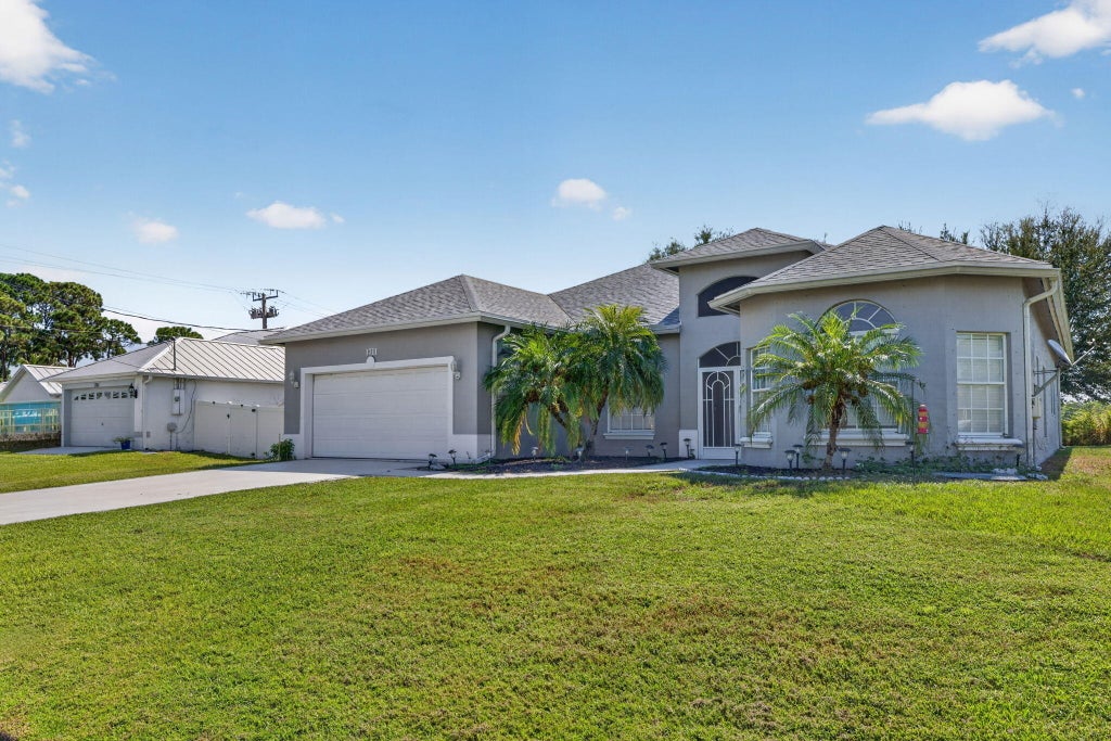 Photo of 1711 SE Fairfield Street, Port Saint Lucie, FL 34983 (MLS # B26066907)
