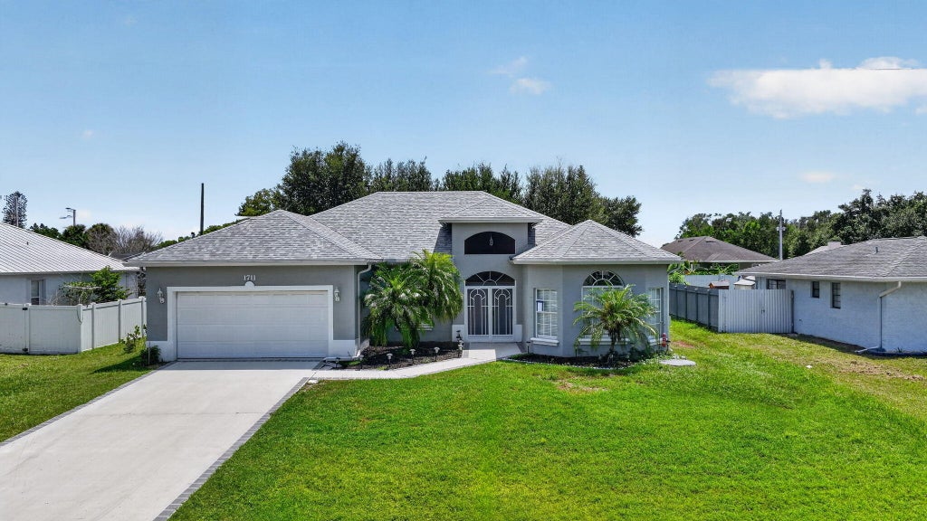 Photo of 1711 SE Fairfield Street, Port Saint Lucie, FL 34983 (MLS # B26066907)