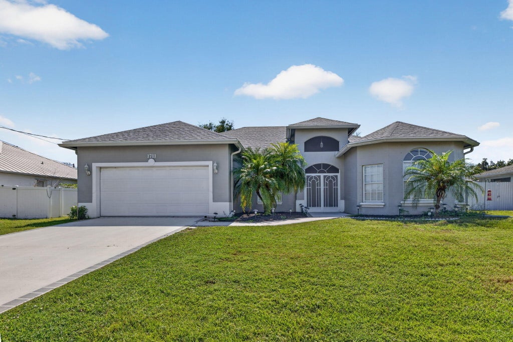 Photo of 1711 SE Fairfield Street, Port Saint Lucie, FL 34983 (MLS # B26066907)