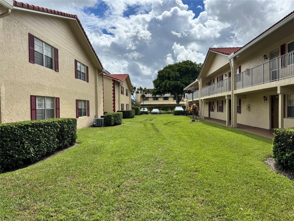 Photo of 3590 N University Drive #V-6, Coral Springs, FL 33065 (MLS # F10530208)