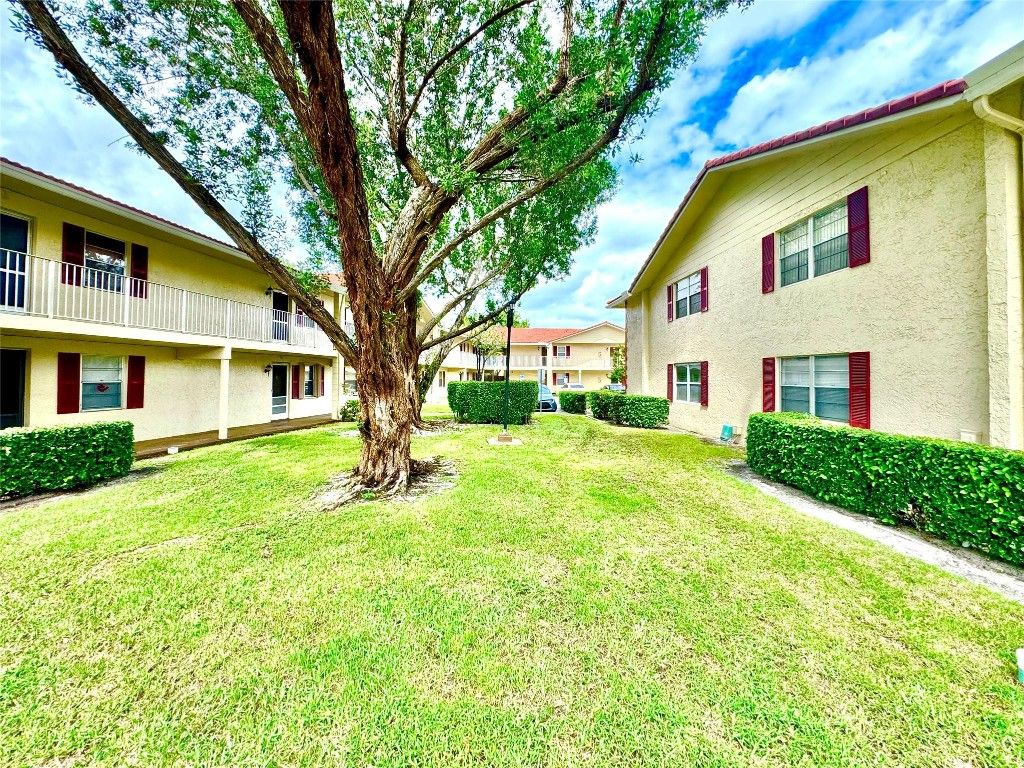 Photo of 3590 N University Drive #V-6, Coral Springs, FL 33065 (MLS # F10530208)