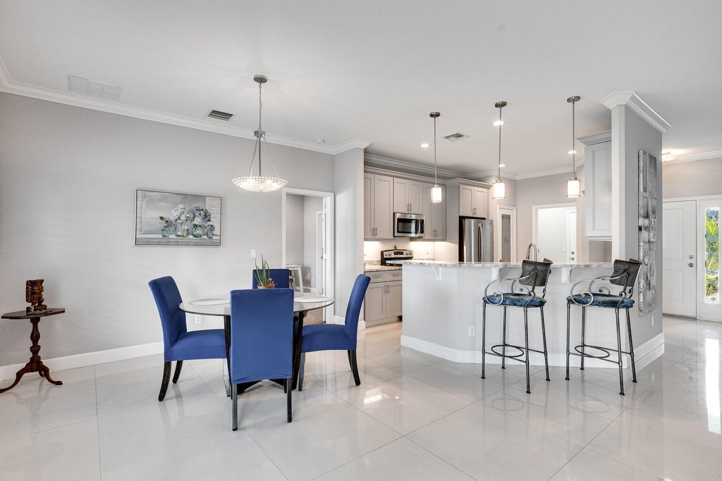 Photo of 4066 SW Port St Lucie Boulevard, Port Saint Lucie, FL 34953 (MLS # R11050398)
