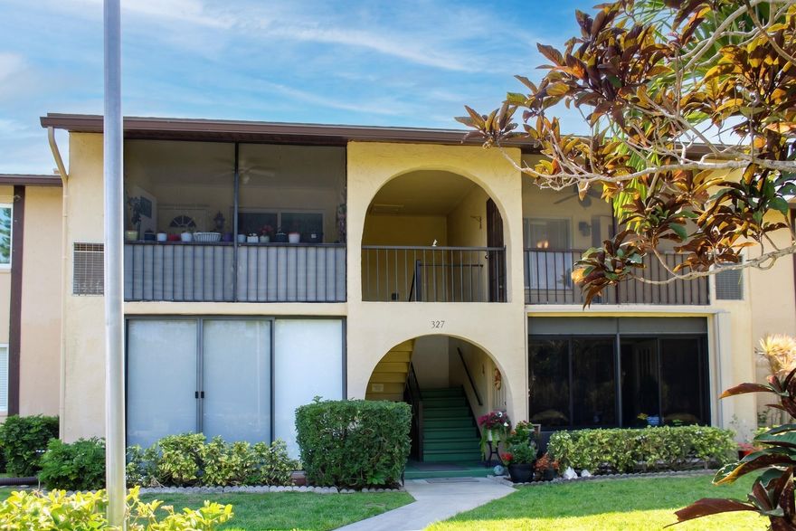 Welcome to this bright and spacious second-floor condo in the highly sought-after Pine Ridge III 55+ community. This beautifully maintained 2-bedroom, 1.5-bathroom residence offers a comfortable 935 sq. ft. of living space, making it one of the larger floor plans in the subdivision.  The unit features an open kitchen and living area, perfect for entertaining or relaxing. Step out onto your private screened porch to enjoy the refreshing Florida breeze and serene garden views. Recent upgrades include a brand-new A/C unit for energy-efficient comfort and an in-unit laundry area for ultimate convenience.