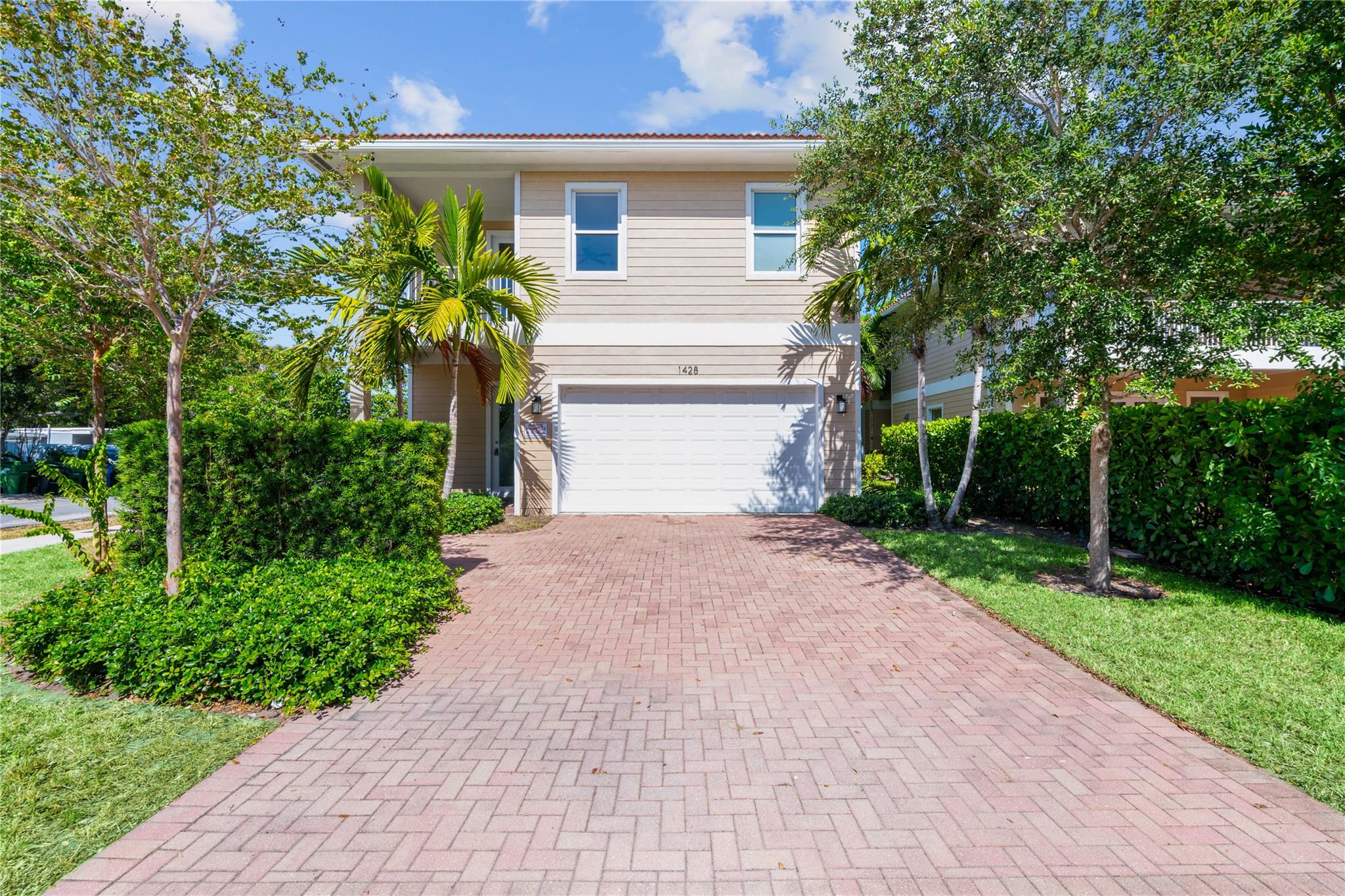 Spacious 4 bedroom, 3.5 bathroom two story townhome with a 2 car garage located in the heart of Fort Lauderdale. This new construction home features fresh paint throughout with tile and vinyl flooring throughout, an updated kitchen with quartz counters and stainless steel appliances, fenced in and private green space, impact windows and doors. Large bedrooms with plenty of closet space. Situated close to downtown's vibrant entertainment, music venues, and restaurants, Las Olas Blvd. Close to the Fort Lauderdale Airport and the white sandy beach. Low HOA, $150 per month. Seller financing available!