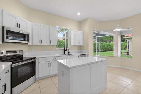 Photo of 6594 Jog Palm Drive, Boynton Beach, FL 33437 (MLS # B26037275)
