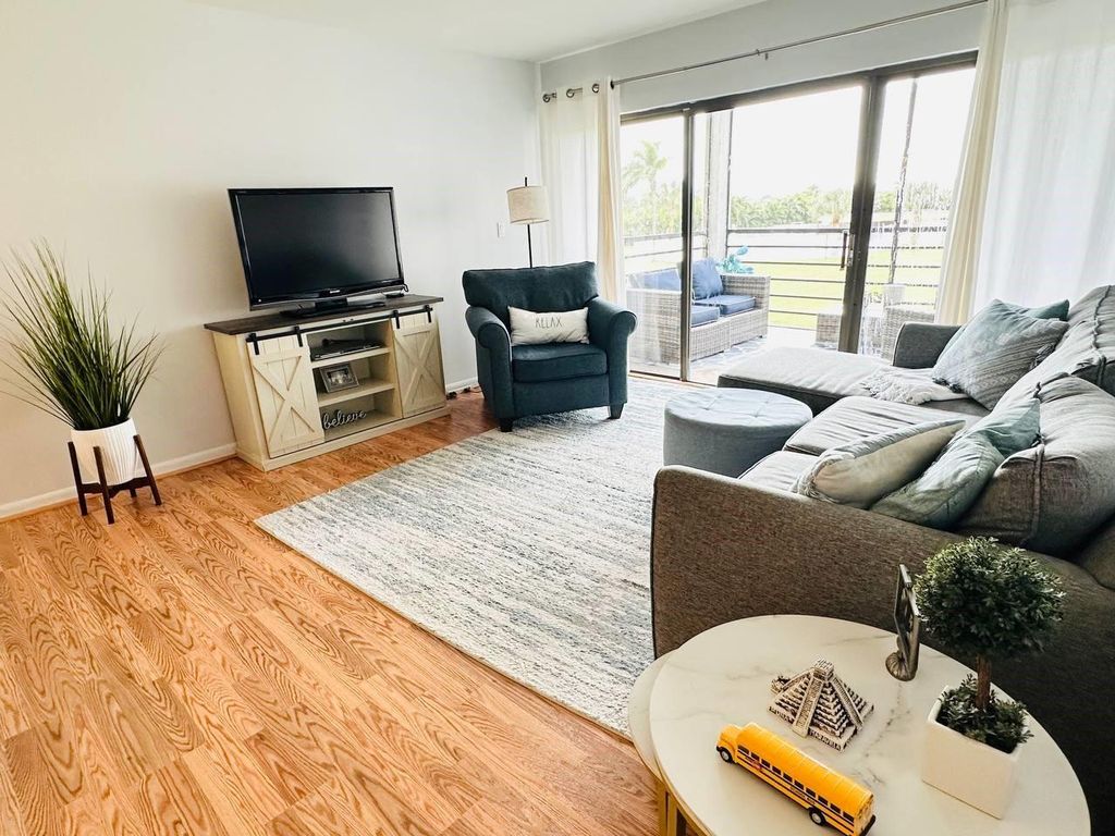 Photo of 9300 SW 8th St #214, Boca Raton, FL 33428 (MLS # F10541199)