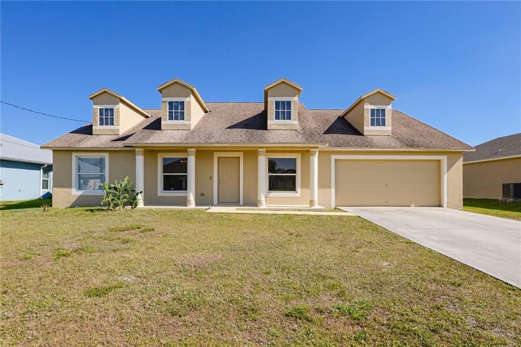 Photo of 5765 NW Cone Street W, Port St Lucie, FL 34986 (MLS # R10913606)