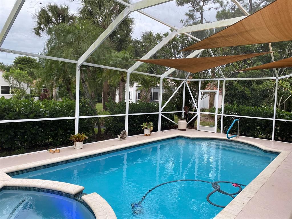Photo of 121 Egret Circle, Greenacres, FL 33413 (MLS # R10759797)