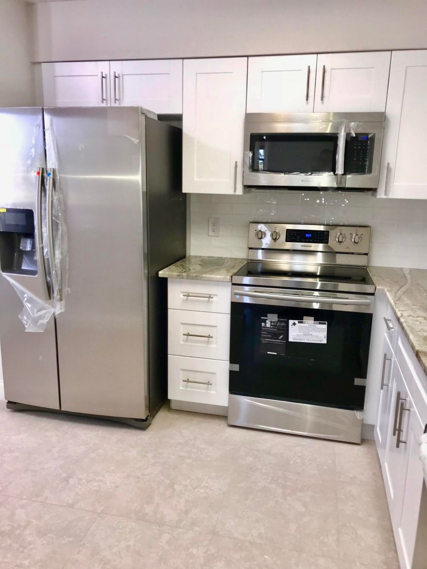 Looking for a totally remodeled home overlooking a beautiful lake in Delray Beach, centrally located to shopping, restaurants, hospitals and the active lifestyle of Atlantic Avenue. Does fun in the sun of the Atlantic ocean pique your interest? The search is over.  Lovely abode that delivers all the conveniences and modern luxuries you could want. A 2 BR 2 bath condo with outstanding amenities like a 50,000 sq ft, 610 seat Theatre offering  shows and weekly events, clubs to join. If you like water entertainment enjoy water aerobics in the indoor heated swimming pool, or relax in the sauna and whirlpool.There is bocce ball, shuffleboard. A fitness center with weight training and cardio equipment. Continuing education classes to empower your mind. Lets mention the new friends you can make. Enjoy the library.Tennis anyone? 9 Tennis courts.The entire community is geared to making your life as simple or involved as you want to be. Don't want to drive? There is a Trolly bus.This particular building has it's own satellite outdoor pool. Pets are allowed. Leasing can be immediate. Come see for yourself and make your dreams happen