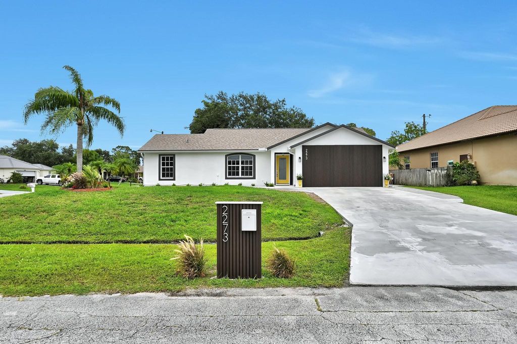 Photo of 2273 SW Phyllis Lane, Port Saint Lucie, FL 34953 (MLS # F10512342)