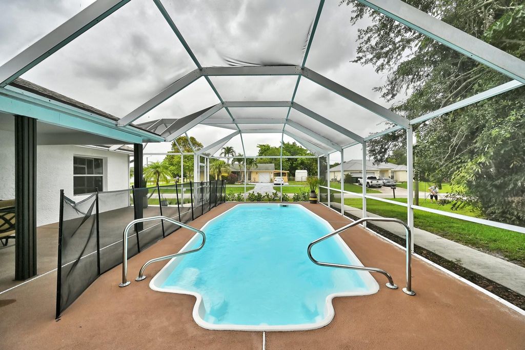 Photo of 2273 SW Phyllis Lane, Port Saint Lucie, FL 34953 (MLS # F10512342)