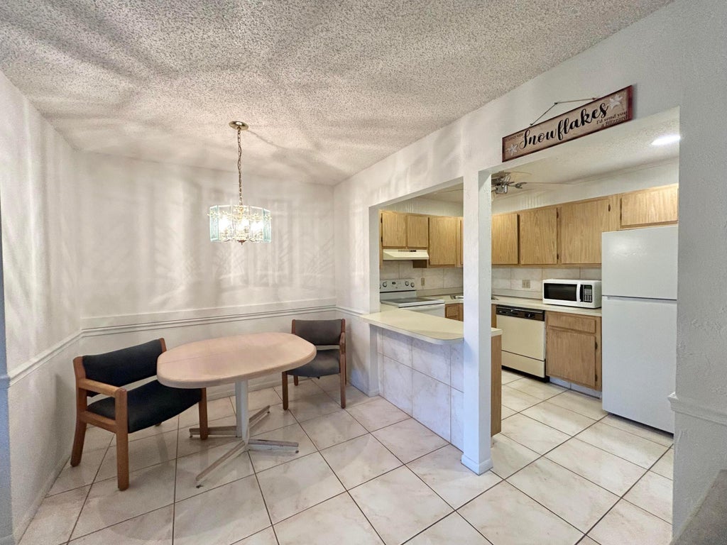 Photo of 435 Pine Glen Lane #B-2, Greenacres, FL 33463 (MLS # B26079024)