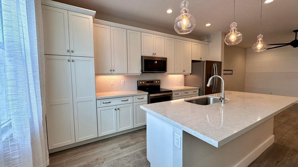 Photo of 1832 Sandpiper Pointe Place, Deerfield Beach, FL 33442 (MLS # B26045686)