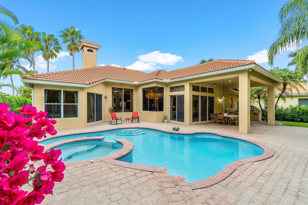 Photo of 102 Pembroke Drive, Palm Beach Gardens, FL 33418 (MLS # R10975740)