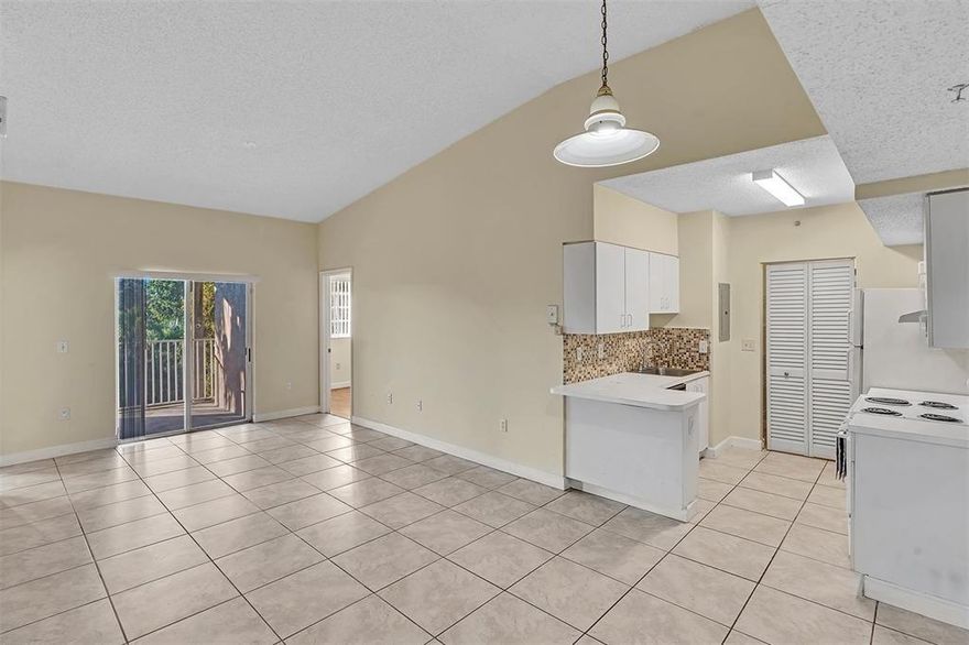 * MOTIVATED SELLER * FLEXIBLE TERMS * 3rd-floor, vaulted-ceiling corner condo move-in ready opportunity or ideal investment! This 2 bed 2 bath unit features split floorplan, each bedroom boasting its own full bath. Well-laid out living space create an open, airy feel. Convenient in unit laundry. Investor friendly no rental restrictions; currently occupied by a month-to-month tenant who would love to stay or provide seamless occupancy options. Perfect location under 5 minutes to Hard Rock Casino & Hotel, quick access to Sawgrass Mall, Fort Lauderdale Airport & Port, Aventura, Las Olas, Miami Beach, and arenas for games & concerts. Close to local dining and shopping. Ideal for both commuters & vacationers. Amenities: Rentals allowed, Pet friendly, gated entry, clubhouse & pool.