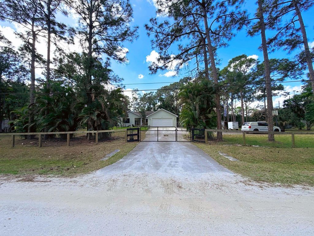 Photo of 12070 N 52nd Road N, West Palm Beach, FL 33411 (MLS # R11167966)