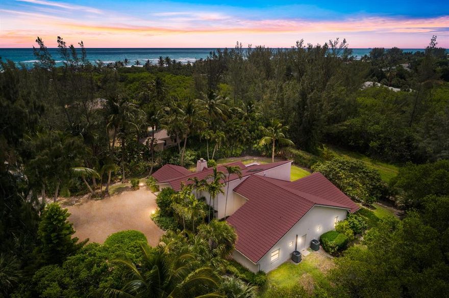 Rare opportunity - Jupiter Island Gem! This lovely home is Nestled at the end of a private road! The Lush landscaped property offers peace and seclusion in the well sought-after Jupiter Island Community! This home welcomes you into the great room with magnificent beamed cathedral ceilings! 4 large bedrooms | 3.5 baths | Expansive dining room | Library and office with separate entrance insures you always have room for family and friends! This home is flooded with natural light throughout the day. Natural preserve surrounds two sides of the property and the in-ground pool is located directly off the back patio. Solitude and tranquility abound. Enjoy Private access to a sheltered beach only a short walk away. Minutes to Hobe Sound with easy access to US 1 and I-95.