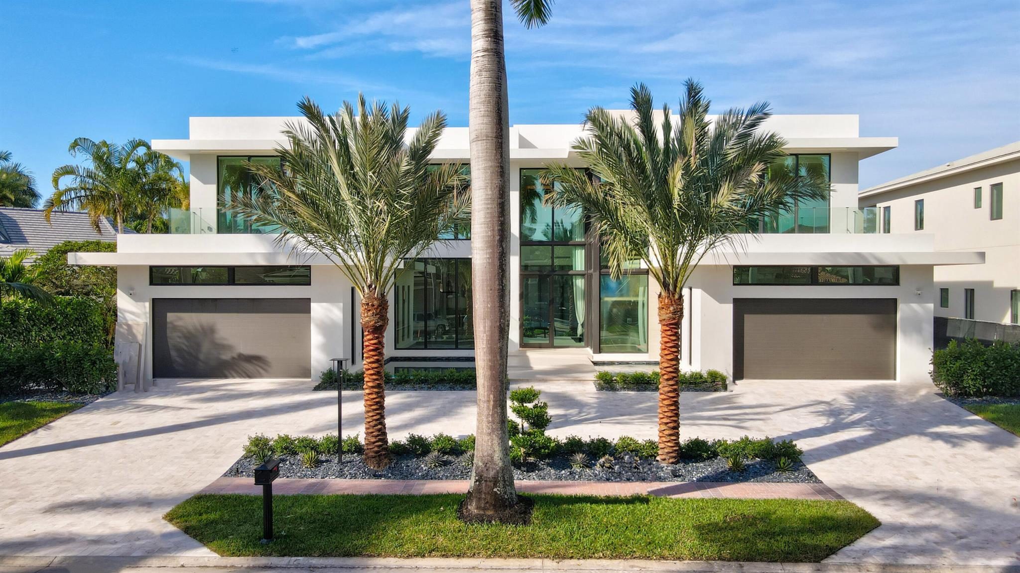 Reich Construction Group continues to offer an elevated level of excellence in design and craftmanship in this new fully furnished contemporary offering, with interiors by Michael Gray. A front glass entry opens to a dramatic two story great room with exceptional multiple lake and golf course vistas. A primary bedroom suite, kitchen with rear patio facing dining/dinette area, office, club/media room, expansive covered patio entertainment area, elevator and dual two car garages all reside on the first floor. A 'showpiece' staircase ascends to four en-suite bedrooms, a lounge, media and wellness/fitness areas. More exciting details are coming soon. See More...