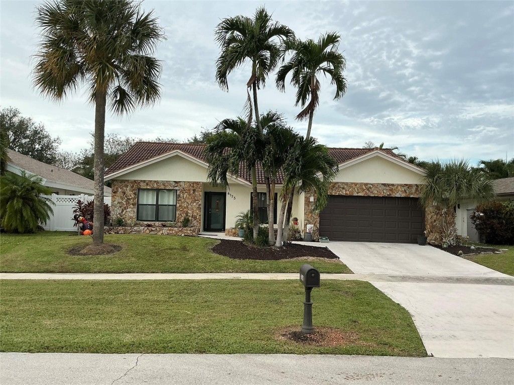 Photo of 6175 Amberwoods Drive, Boca Raton, FL 33433 (MLS # F10542068)