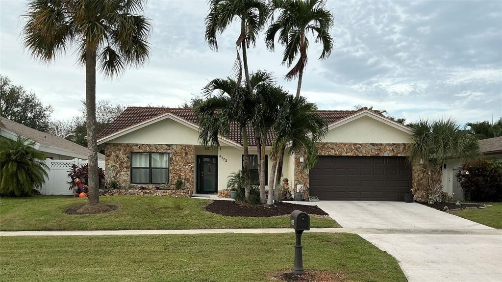 Photo of 6175 Amberwoods Drive, Boca Raton, FL 33433 (MLS # F10542068)