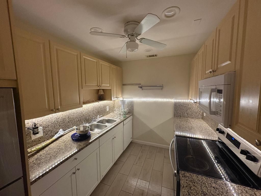 Photo of 1896 Palmland Drive #2, Boynton Beach, FL 33436 (MLS # R11102493)