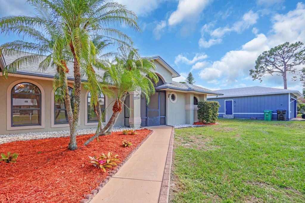 Photo of 2774 SE Howell Avenue, Port Saint Lucie, FL 34952 (MLS # R11100097)