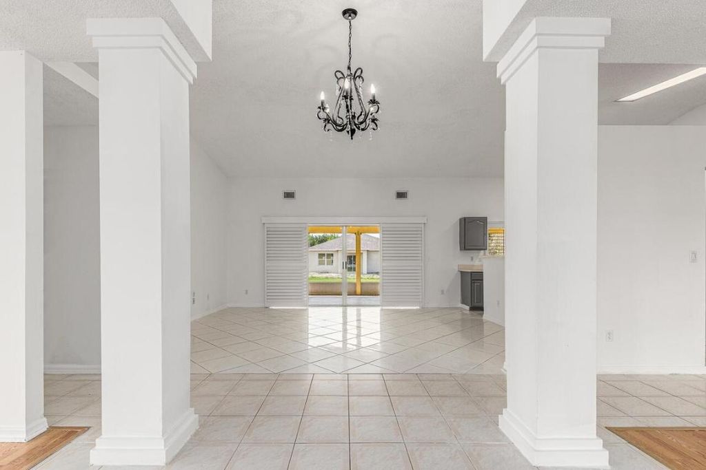 Photo of 1126 SW Calmar Avenue, Port Saint Lucie, FL 34953 (MLS # R11151552)