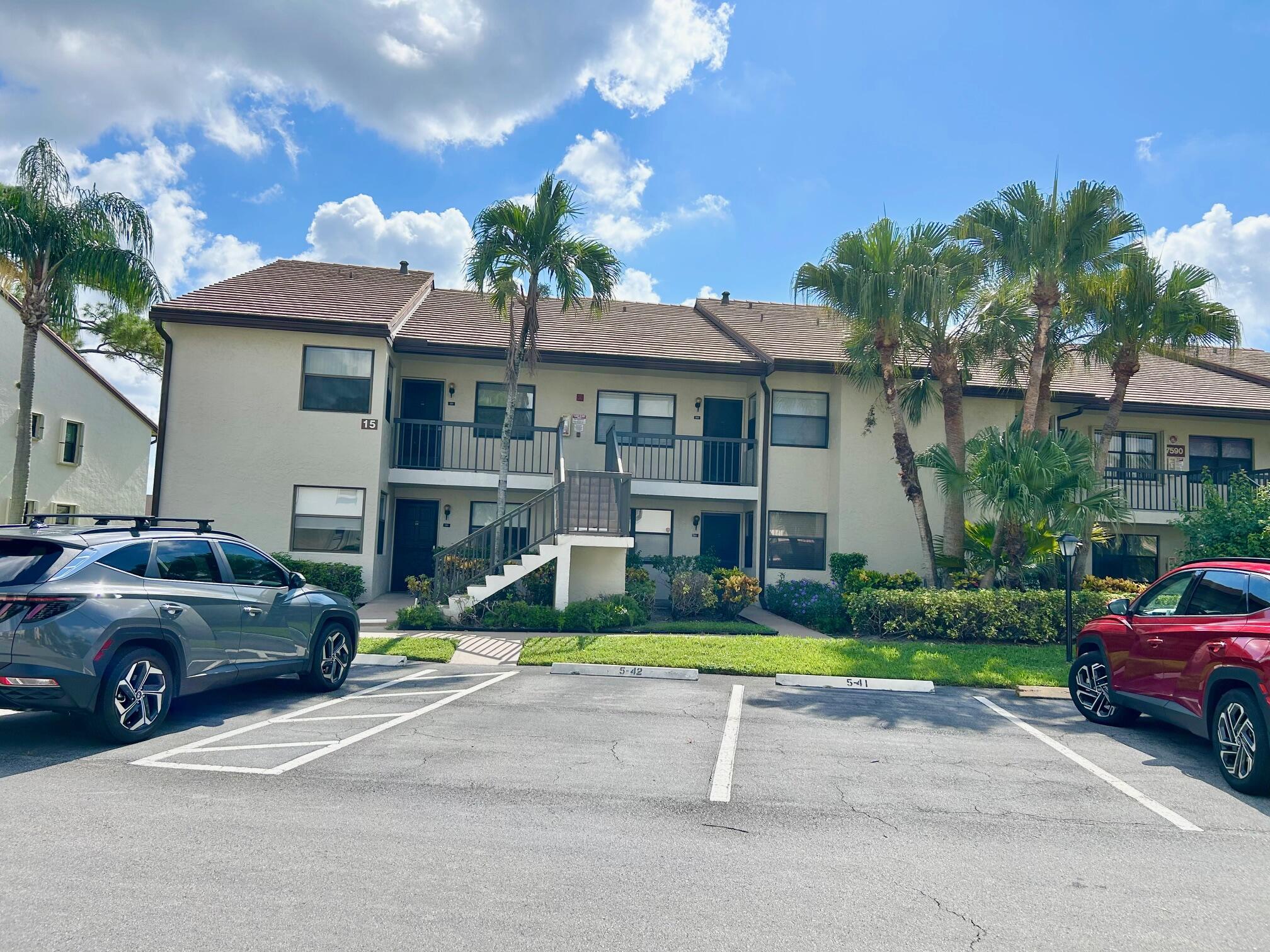 2 bedroom 2 bath 1st floor corner condo. Parking right up front. Large eat in kitchen with pass through to dining room. 3rd room with closet can be used as office/den. Master bedroom features a walk in closet and ensuite bathroom with walk in shower. enclosed back porch with water view and laundry closet. Community offers large clubhouse, lobby, theater with entertainment, billiards, bocce and shuffleboard, library, tennis, 2 heated swimming pools, hot tub, whirlpool and sauna. Bus service from the clubhouse to shopping, medical and excursions. Lake Worth Beach 10 miles away. Close to turnpike, shopping and medical.