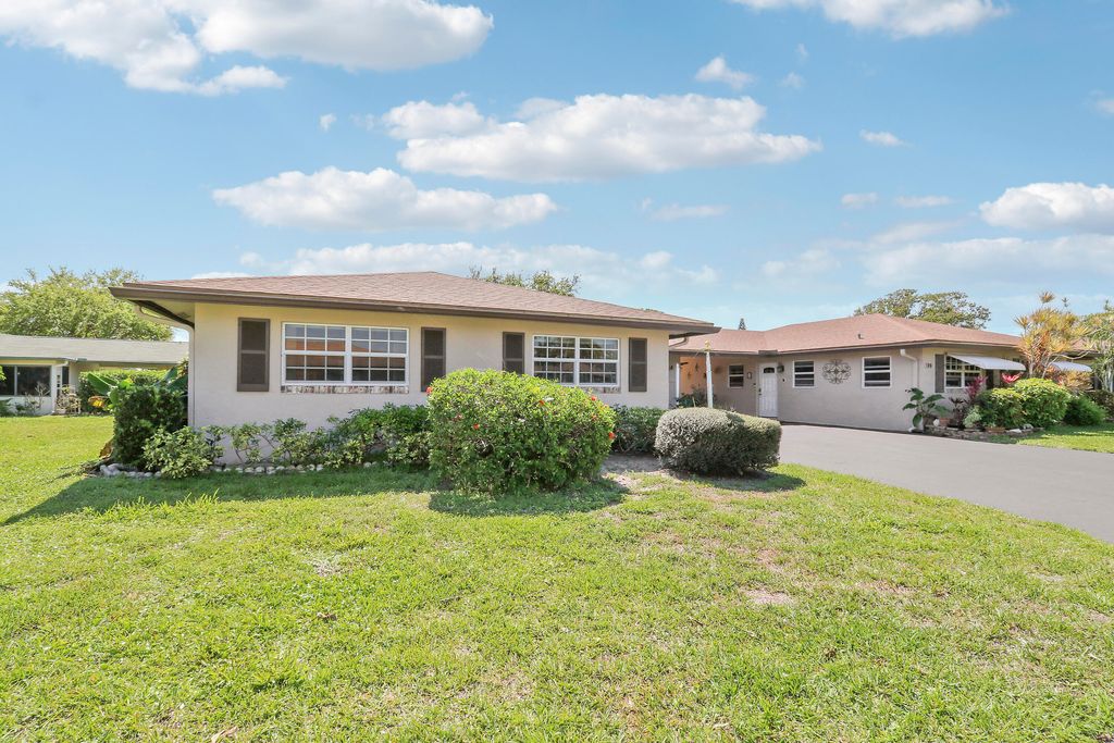 Photo of 129 Mockingbird Lane, Delray Beach, FL 33445 (MLS # B26006366)
