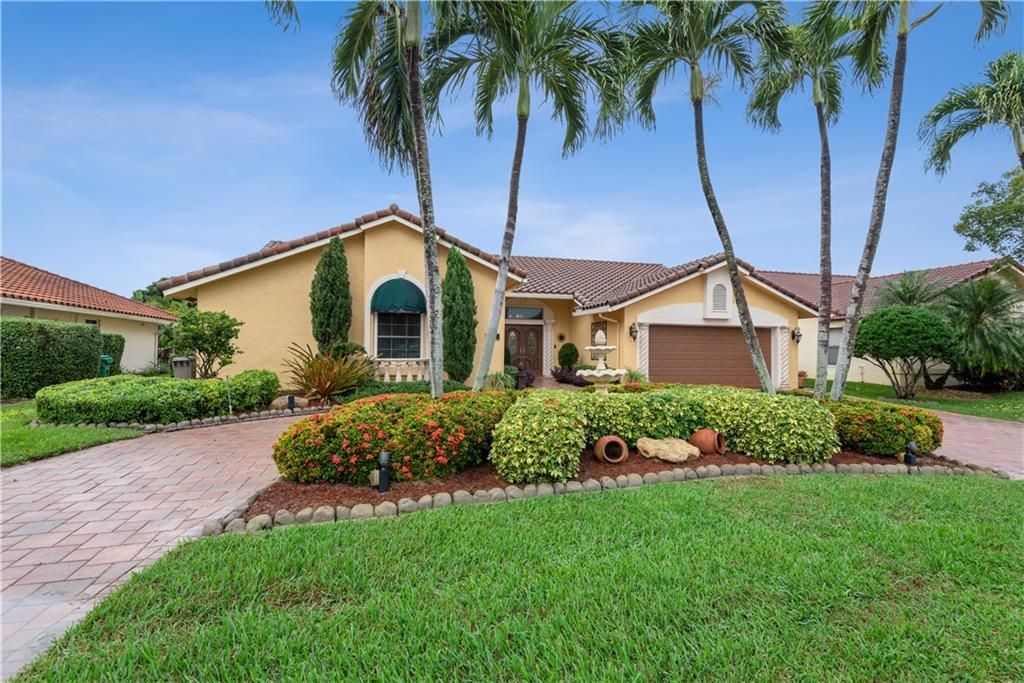 Photo of 4114 NW 73rd Way, Coral Springs, FL 33065 (MLS # F10308866)