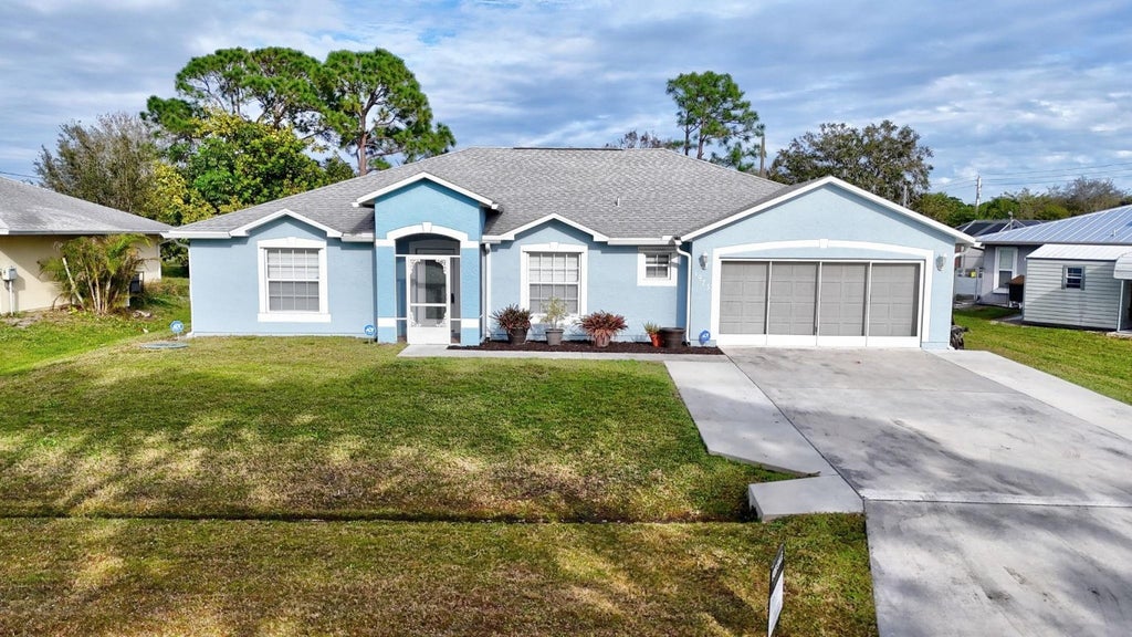 Photo of 1973 SW Sylvester Lane, Port Saint Lucie, FL 34984 (MLS # F10481313)