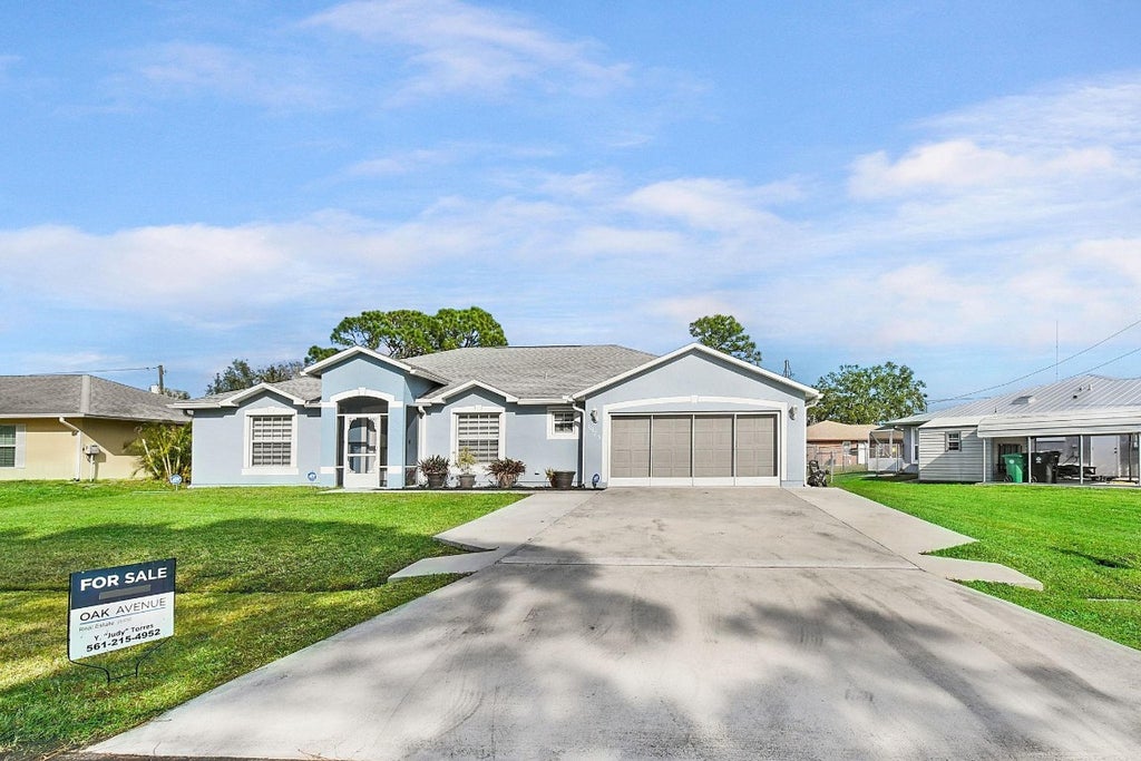 Photo of 1973 SW Sylvester Lane, Port Saint Lucie, FL 34984 (MLS # F10481313)