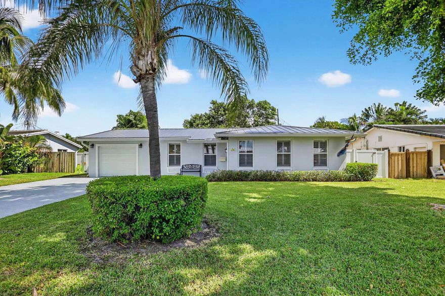 Beautifully Updated Home in Desirable Lighthouse Point!Welcome to this spacious and thoughtfully updated 3-bedroom, 3-bathroom ranch-style home, ideally located in the highly sought-after community of Lighthouse Point just minutes from the beach, with three beautifully maintained parks, a public library, and excellent city services. With close proximity to schools, beaches, dining, and major airports, Lighthouse Point blends relaxed coastal living with everyday convenience.This stunning home features two en-suite bedrooms, perfect for family living or guests. Enjoy peace of mind with a new roof, impact-resistant windows and doors throughout, and a modern alarm system plus an A/C unit less than 5 years old for year-round comfort.