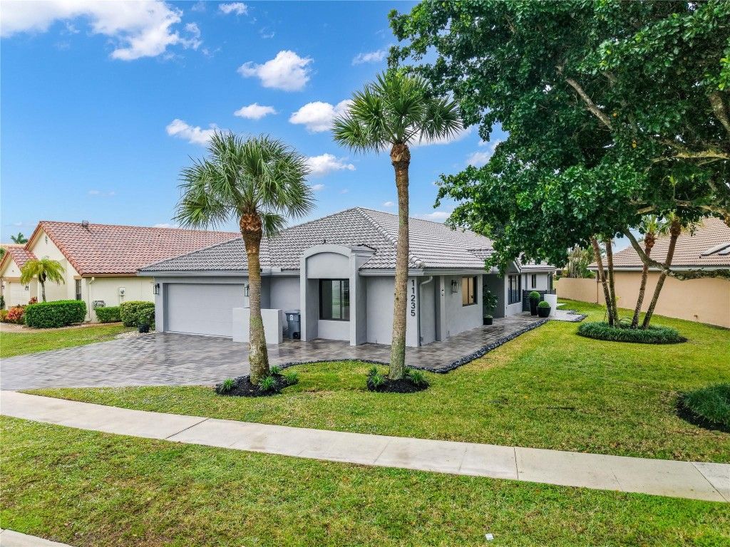 Photo of 11235 Clover Leaf Circle, Boca Raton, FL 33428 (MLS # F10539169)